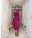 Velvet twin set with plum feather-trim crop top and pencil skirt