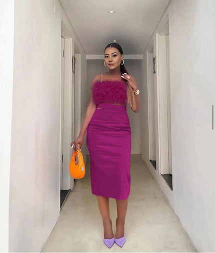 Velvet twin set with plum feather-trim crop top and pencil skirt