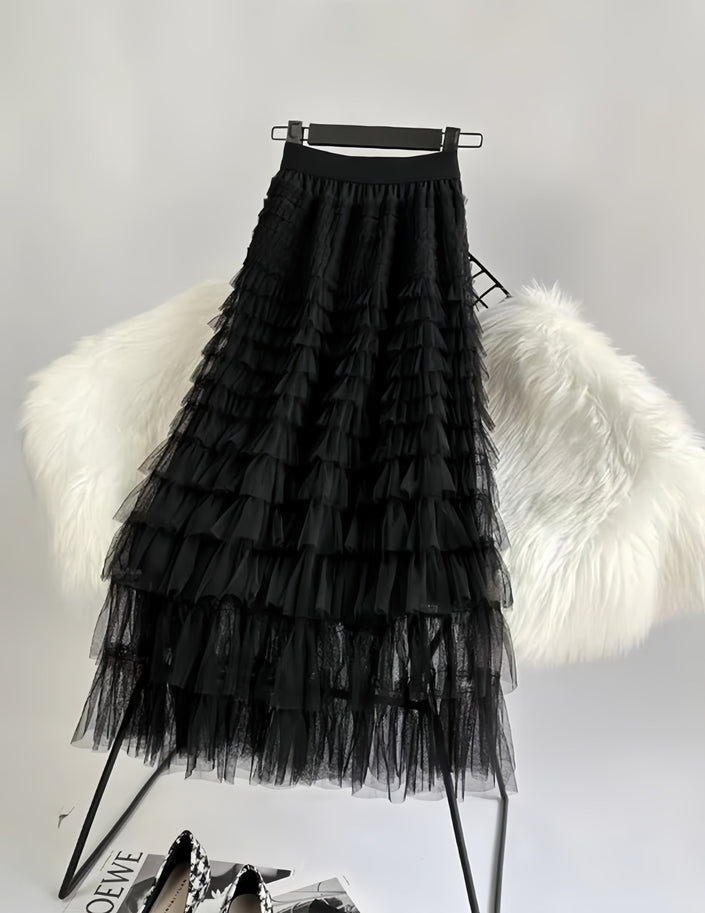 Black pleated layered midi skirt with ruffled tiers and tulle-like texture