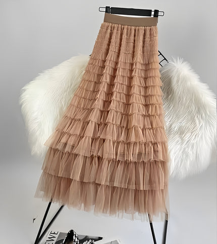 Burlywood pleated layered midi skirt with ruffled tiers and soft tulle texture
