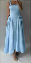Sky-blue pleated maxi dress with square neckline and gathered spaghetti straps