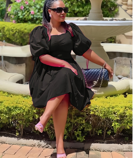 Black puff-sleeve A-line dress with ruched bodice and gathered skirt