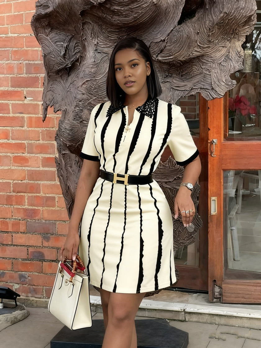Cream-and-black striped V-neck dress with short sleeves and lace-look neckline trim