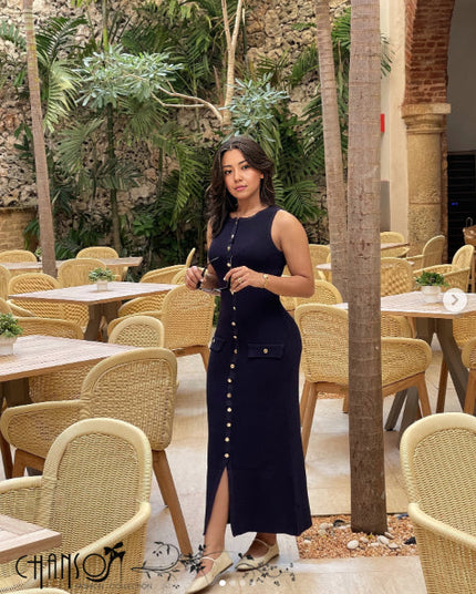 Sleeveless midi dark knitted dress with button front, round neckline, side slit, patch pockets