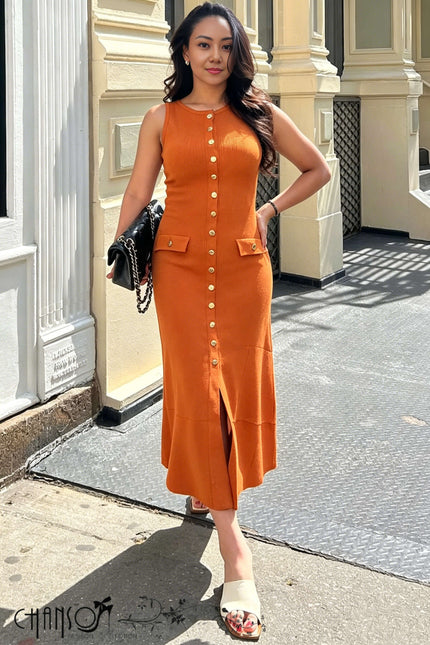 Sleeveless midi orange knitted dress with button front, round neckline, side slit, patch pockets