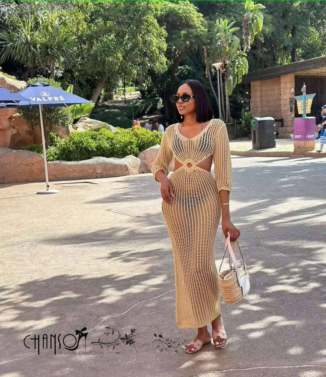Tan crochet maxi dress with V neckline and circular back cutout, 3/4 sleeves