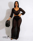 Black crochet maxi dress with V neckline and waist cutout, long sleeves
