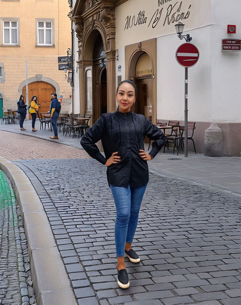 Black long-sleeve pleated blouse with button front and stand collar