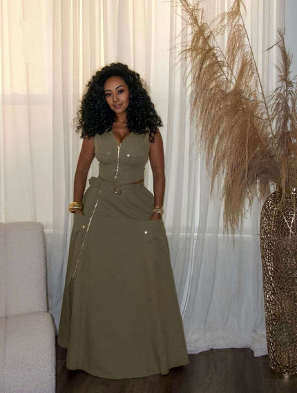 Army-green maxi dress with front zipper, gold buttons, belted waist and side slit