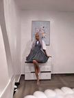 Dark grey mini dress with puff sleeves and V-neck bodice, gathered skirt