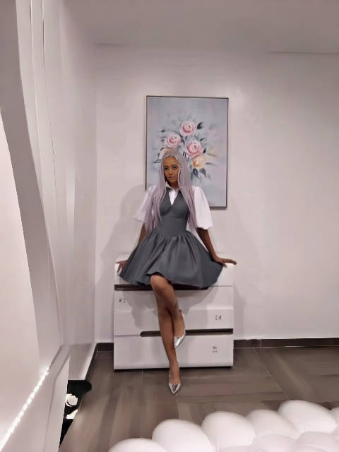 Dark grey mini dress with puff sleeves and V-neck bodice, gathered skirt