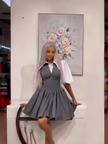 Grey mini dress with puff sleeves, V-neck and flared gathered skirt