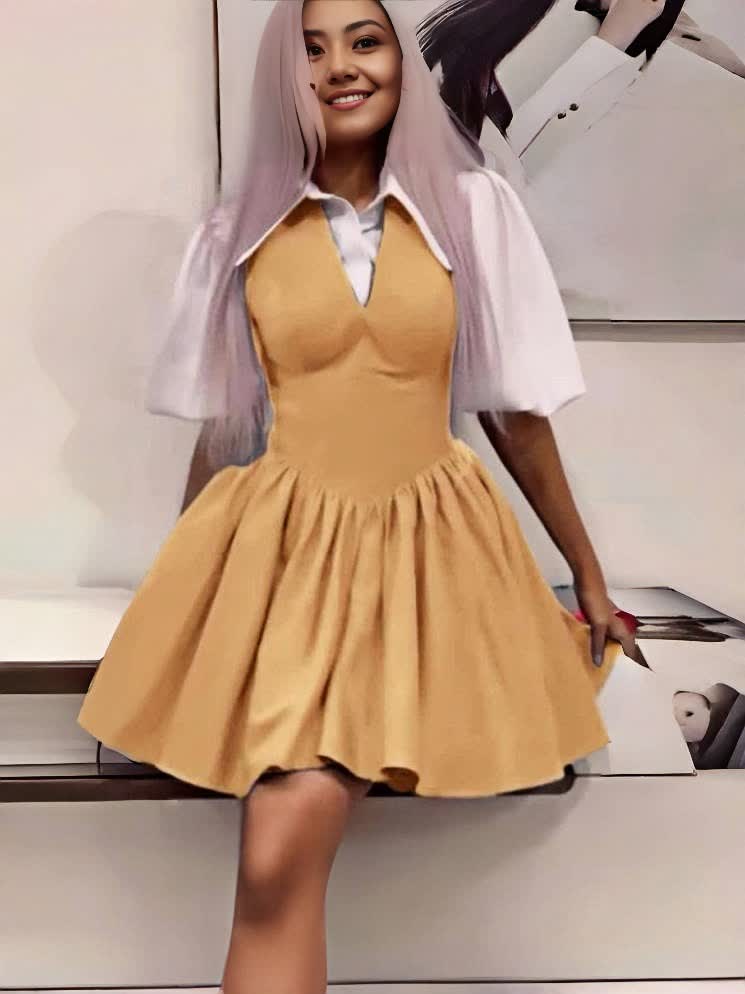 Tan mini dress with puff sleeves, V-neck front and gathered flare hem