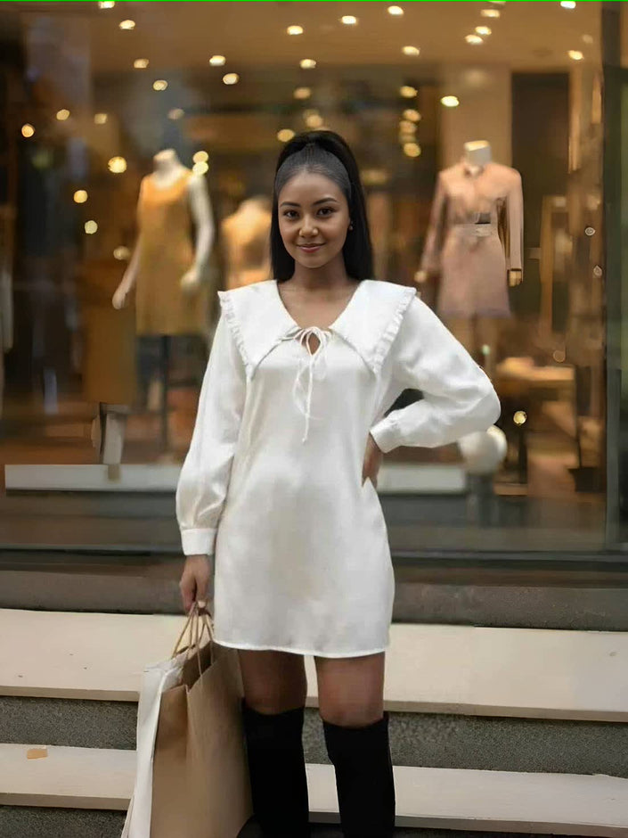 White ruffle-collar mini dress with tie-neck neckline and long sleeves