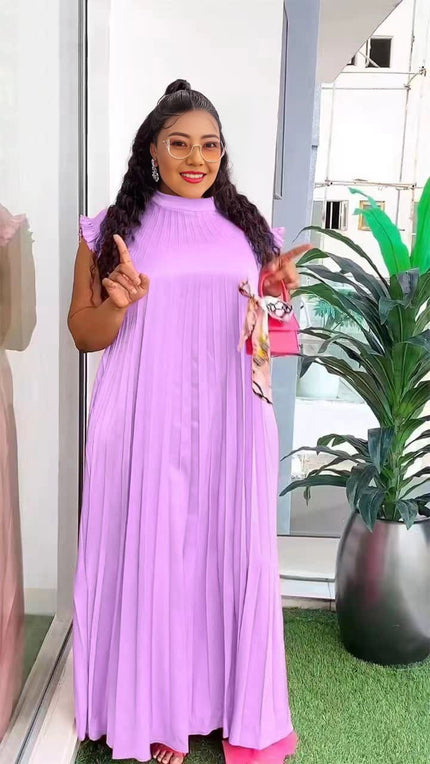 Light-purple pleated maxi dress with high neck and long flowing skirt