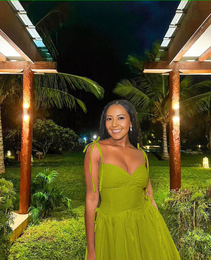 Green sleeveless maxi dress with sweetheart neckline and gathered waist
