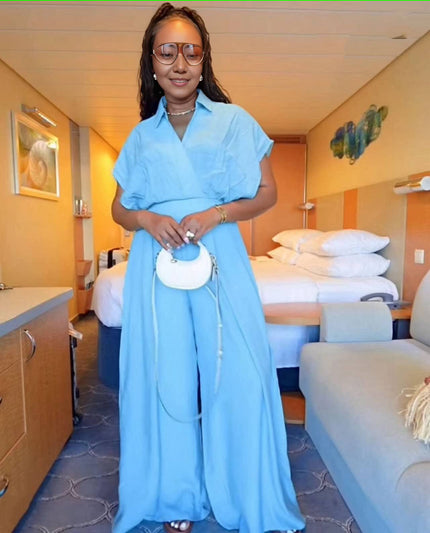 Baby-blue wide-leg jumpsuit with adjustable tie waist, short sleeves