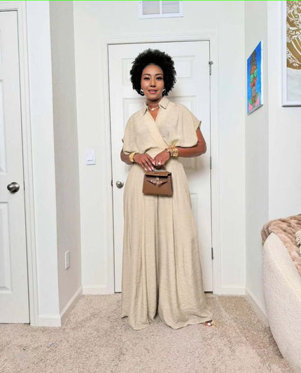 Beige wide-leg jumpsuit with adjustable tie waist and short sleeves