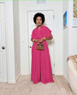 Deep-pink wide-leg jumpsuit with V-neck and adjustable tie waist, short sleeves