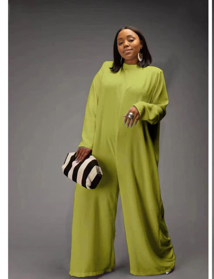 Green relaxed-fit jumpsuit with long sleeves, high neckline, wide legs, side pockets