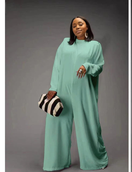 Turquoise relaxed-fit jumpsuit with long sleeves, high neckline, wide legs, side pockets