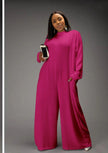 Deep-pink relaxed-fit jumpsuit with long sleeves, high neckline, wide legs, side pockets