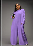 Light-purple relaxed-fit jumpsuit with long sleeves, high neckline, wide legs, side pockets