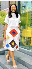 Geometric print midi skirt, white with colorful diamond and block shapes
