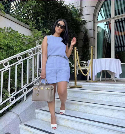 Light-sky-blue sleeveless waist-tie twin set with matching shorts, crew neckline