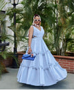 Sky-blue high-waist A-line maxi dress with tiered ruffle trim and V-neck