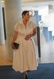 Tan button-front midi dress with lapel and side slit, short sleeves