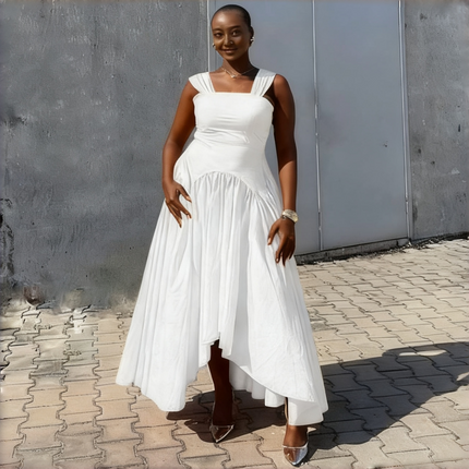 High-low pleated dress in white with square neckline and draped asymmetrical skirt