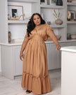 Brown maxi dress with gathered waist and ruffled hem, short tie sleeves, V-neck