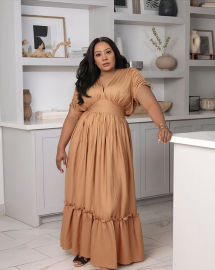 Brown maxi dress with gathered waist and ruffled hem, short tie sleeves, V-neck