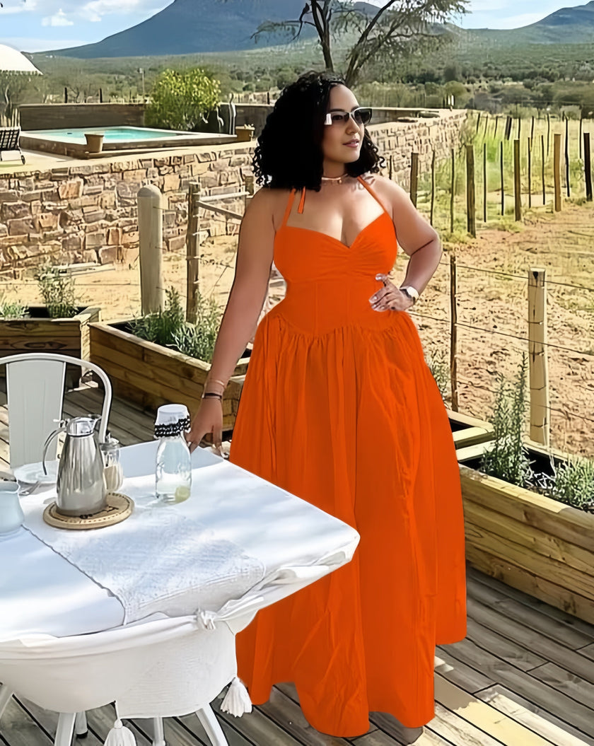 Sleeveless V-Neck Gown with Gathered Waist and Flowing Skirt