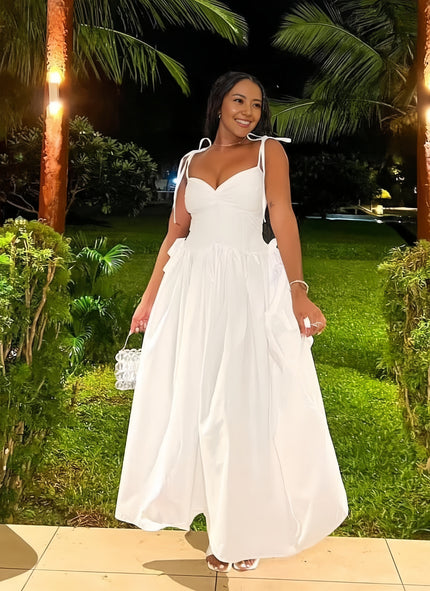 White sleeveless maxi dress with sweetheart bodice and gathered skirt
