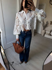 White lace long-sleeve crop blouse with button front and scalloped lace cuffs