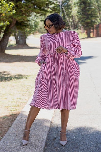 Red-and-white striped puff-sleeve dress with gathered waist, knee length