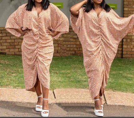 Beige geometric draped dress with V-neck, batwing sleeves, and side drape slit