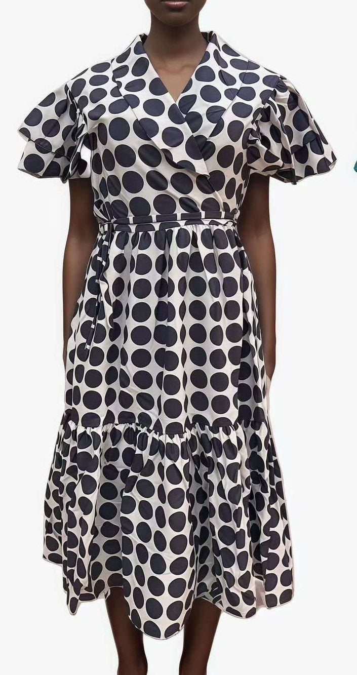 Black-and-white polka-dot midi dress with ruffle sleeves and tiered skirt