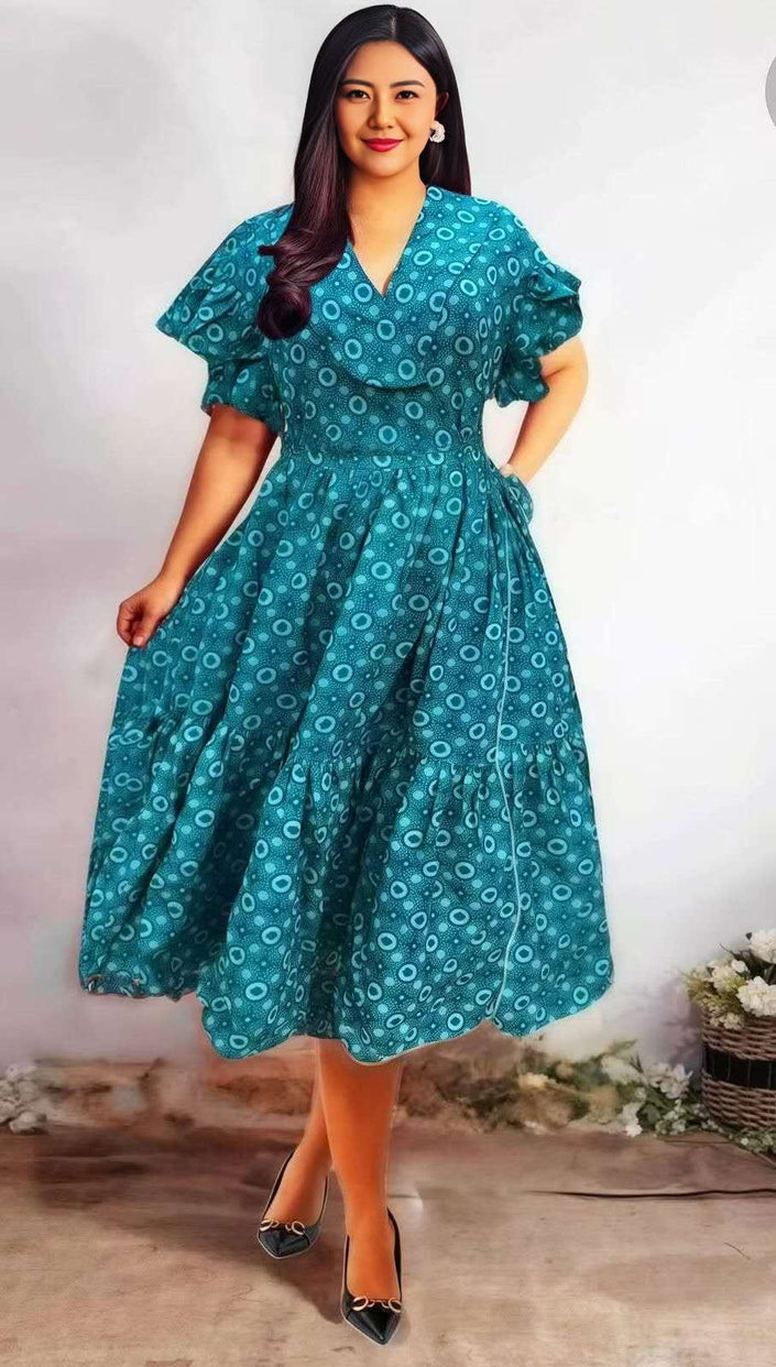 Teal circle-print midi dress with ruffle sleeves and gathered waist
