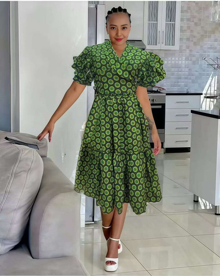 Green circle-print midi dress with ruffle sleeves and gathered waist