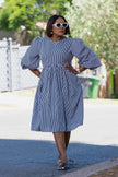 Blue-and-white striped puff-sleeve dress with gathered waist, full gathered skirt