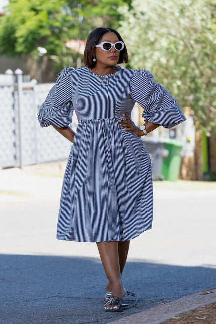 Blue-and-white striped puff-sleeve dress with gathered waist, full gathered skirt