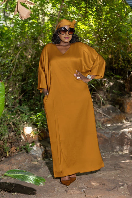 Mustard loose fit maxi dress with V-neck and elbow-length sleeves