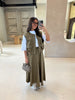 Army-green twin set: utility vest with zip and pockets over maxi skirt