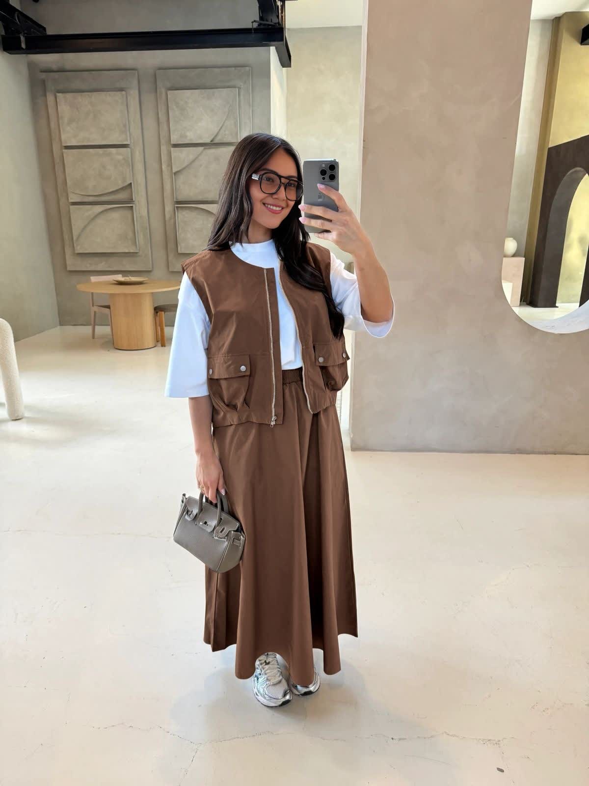 Coffee twin set: utility vest with zip pockets over maxi skirt, adjustable fit