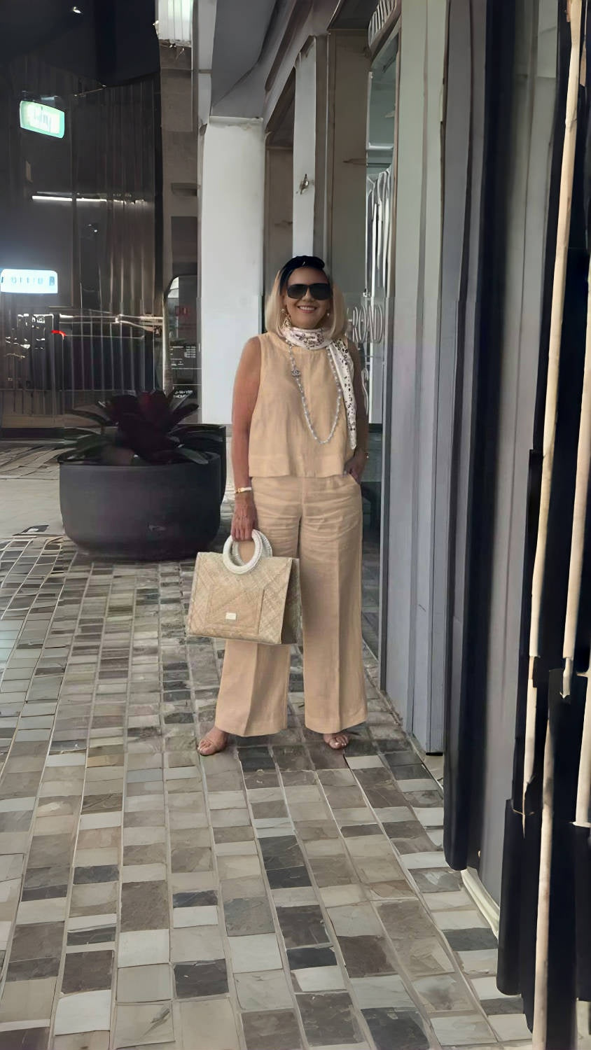 Peach wide-leg pants with relaxed fit and wide flared legs