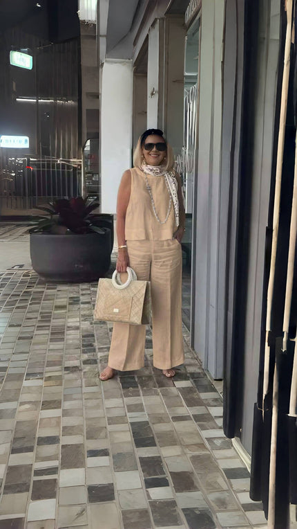 Peach wide-leg pants with relaxed fit and wide flared legs