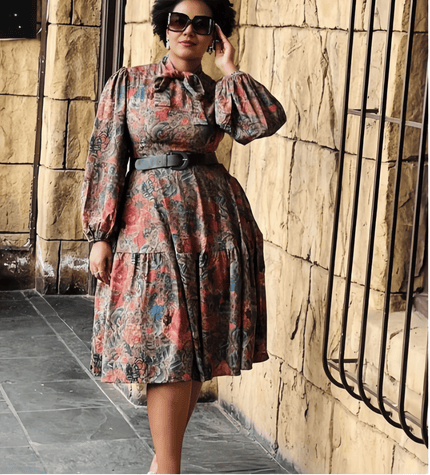 Abstract print puff-sleeve midi dress, gathered skirt, pink and teal.